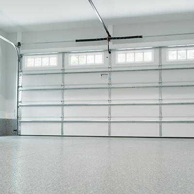 torsion springs sit above the garage door.